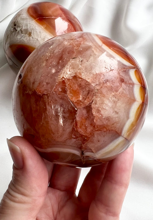 Natural Carnelian Sphere Carving with Quartz Inclusions